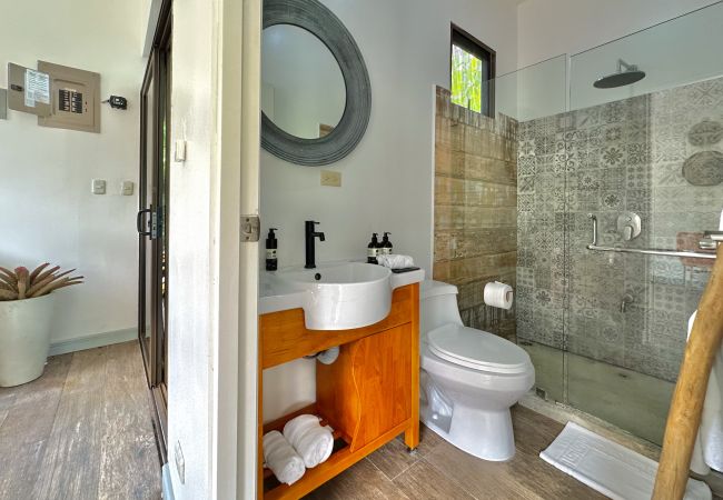 Rent by room in Punta Uva - Deluxe Room in Punta Uva with AC & Pool • Selvatica Rent by room in Punta Uva - Deluxe Room in Punta Uva with AC & Pool • Selvatica