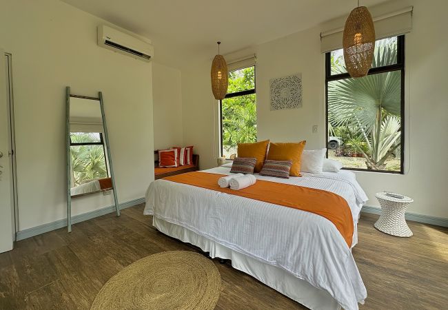 Rent by room in Punta Uva - Deluxe Room in Punta Uva with AC & Pool • Selvatica Rent by room in Punta Uva - Deluxe Room in Punta Uva with AC & Pool • Selvatica